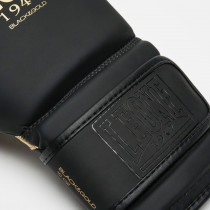 Боксерські рукавиці Leone GN059D Black/Gold 10 унцій (капу в комплекті) Боксерські рукавиці Leone GN059D Black/Gold 10 унцій (капу в комплекті)