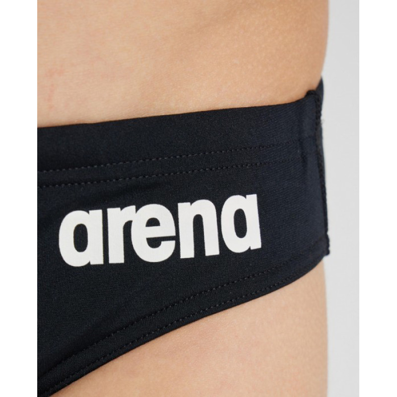 Плавки-сліпи для хлопців Arena TEAM SWIM BRIEFS SOLID чорний, білий Діт 128см
