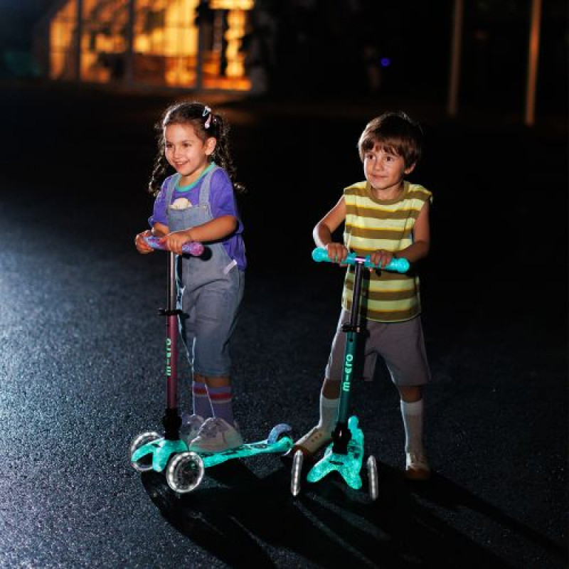 Самокат MICRO складний серії Mini Deluxe Foldable Orion Glow LED – Рожевий