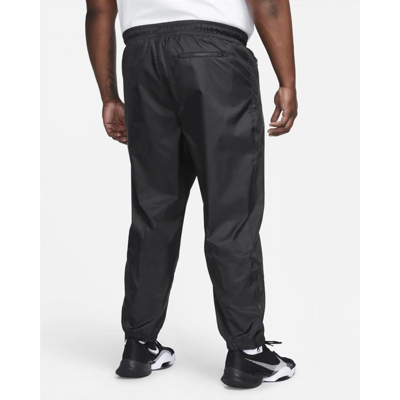 Брюки чоловічі Nike Windrunner (DX0653-011)